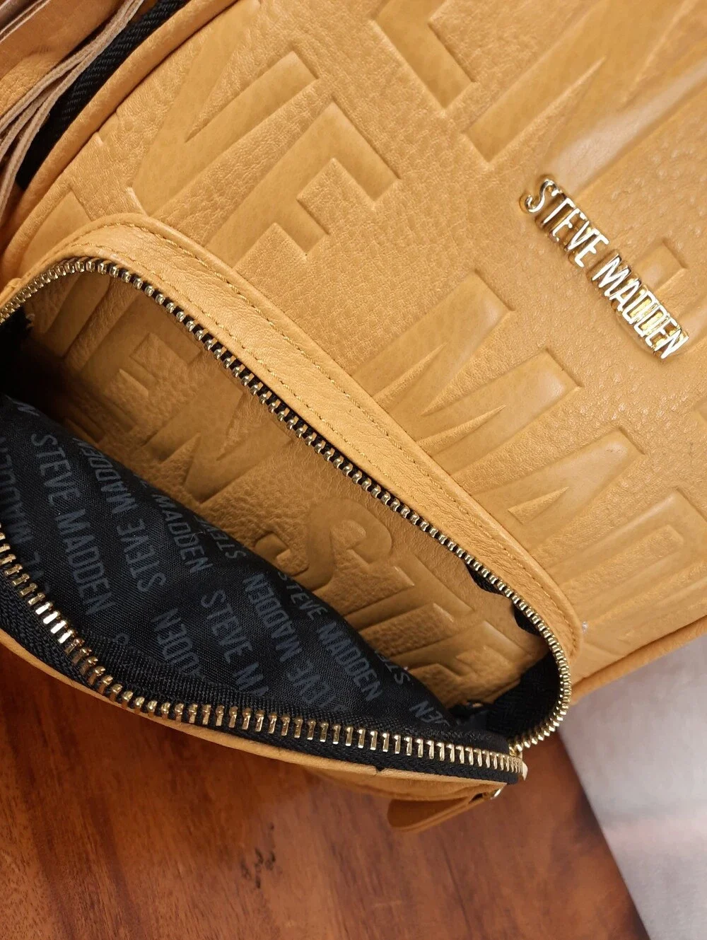 Steve Madden Mustard Mini Tassel Backpack